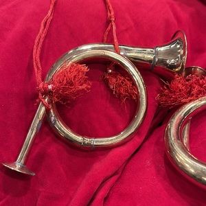 Vintage 2brass French horns. Leave as is if you like the aged tarnish.